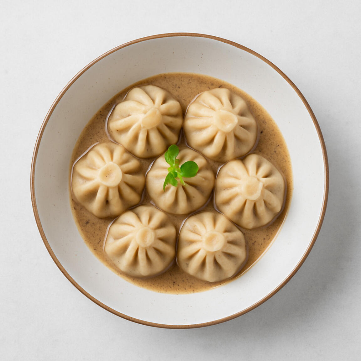 Мини хинкали в перечном  соусе