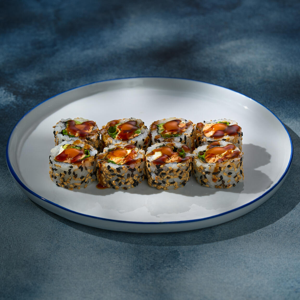 Cooked Salmon Avocado Sushi Roll